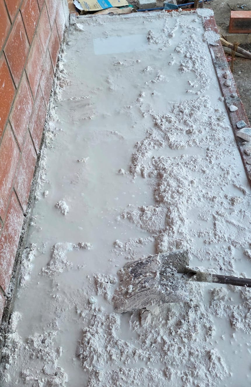 Lime plaster finishing on completed wall section